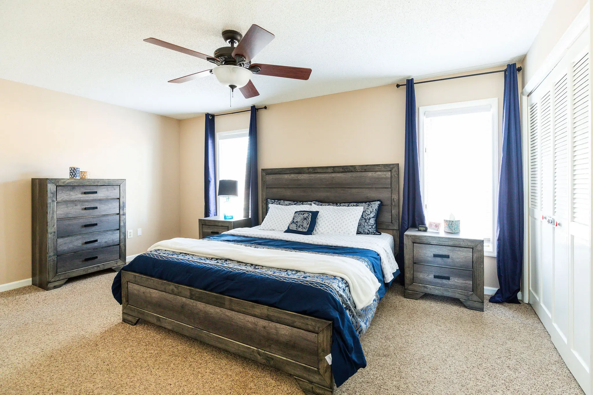 Main-level bedroom with king bed