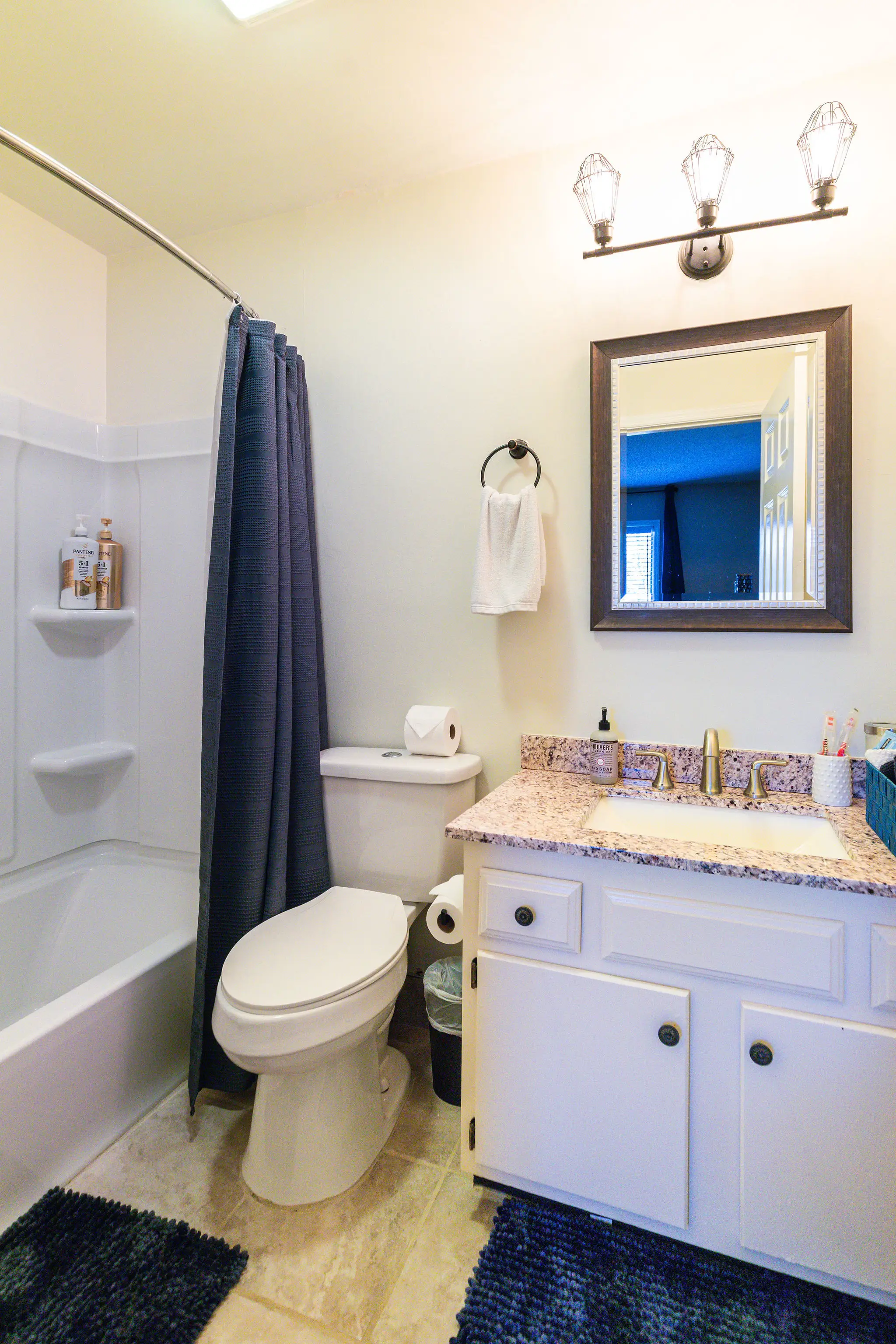 Full bathroom with tub and shower