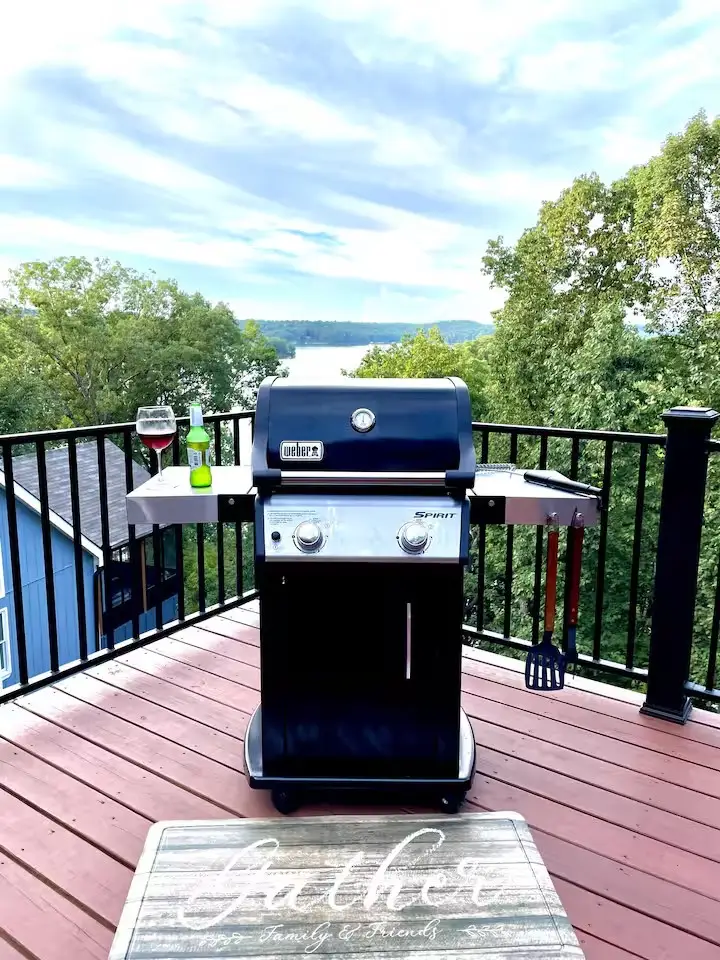 Grill on the deck with a summer lake view